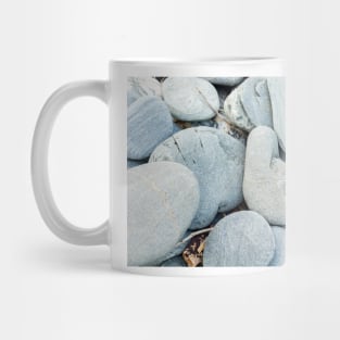 Stone in variety and colour on beach Mug